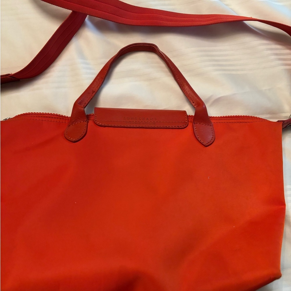 Coral/orange with detachable strap. VERY good condition. - Picture 4 of 5